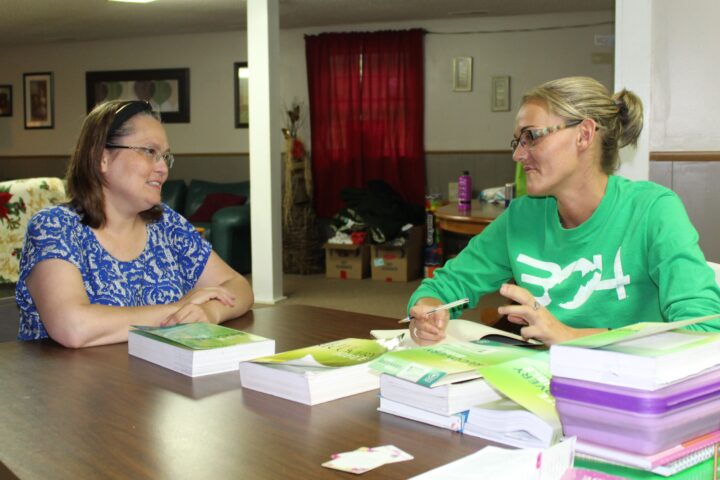 Adult Education Instructor (left), and Jamie Williams, CCWVa adult learner (right), discuss Jamie’s educational goals.