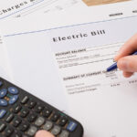 Electric bill charges paper form on the ta