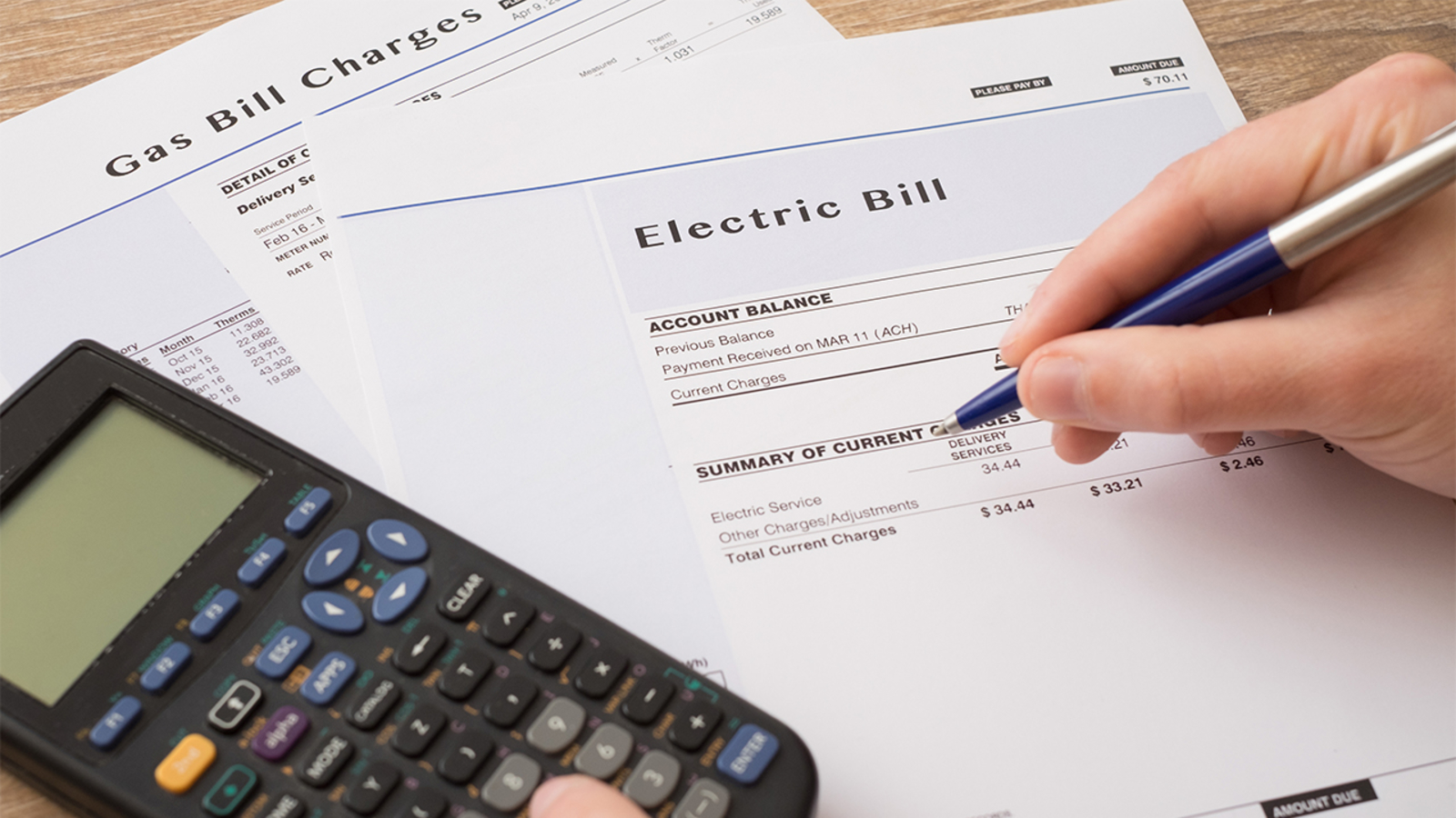 Electric bill charges paper form on the ta