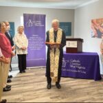 Bishop Mark Brennan blesses Catholic Charities West Virginia offices at Hazel’s House of Hope in Morgantown.
